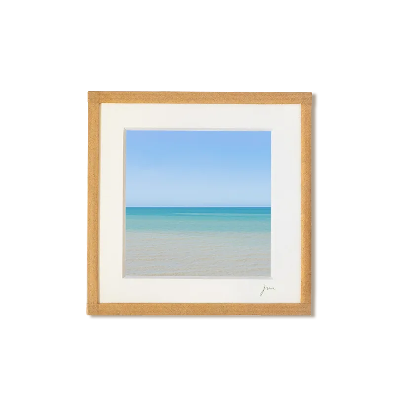 tirage photo petit format encadré à la main représentant l'horizon de la mer du nord