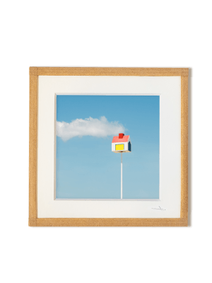 tirage photo petit format encadré à la main représentant un repère de plage en forme de maison avec un nuage sortant de la cheminée